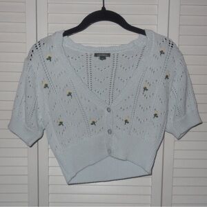 Small knitted cropped shirt